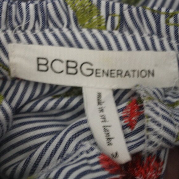 BCBGeneration Sleeveless Ruffle Embroidered Top (369) - Picture 9 of 9